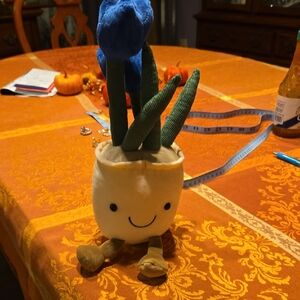 Smiling Squishamllow Plush Plant with Blue Tulip Blooms